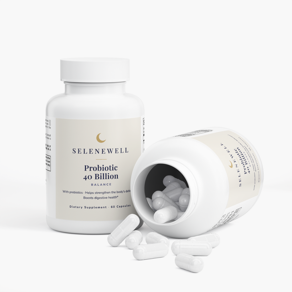 Open Probiotic 40 Billion bottle with capsules spilling onto a white surface